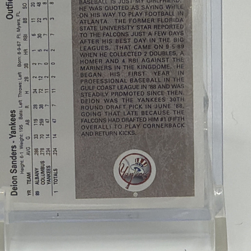 Detail view showing back and condition of Deion Sanders Star Rookie #13 card
