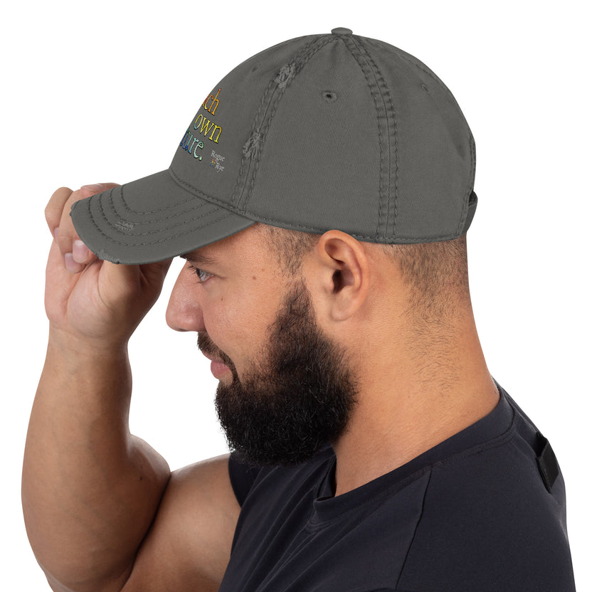 Pride hat, LGBTQIA+ pride cap, rainbow embroidered hat distressed pride baseball cap, unstructured cotton twill cap, Pride apparel accessory, inclusive fashion hat, LGBTQIA+ support merchandise, queer pride fashion, Outright International donation, ally pride gear, Pride month clothing, gender-neutral cap, low-profile dad hat, soft crown baseball cap, adjustable hook-and-loop hat, lived-in look cap, ethically made hat, made-to-order fashion, sustainable pride gear, slow fashion accessories