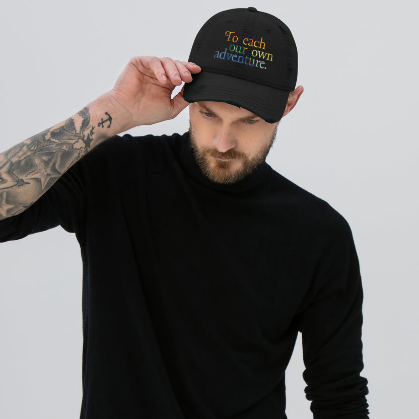 Pride hat, LGBTQIA+ pride cap, rainbow embroidered hat distressed pride baseball cap, unstructured cotton twill cap, Pride apparel accessory, inclusive fashion hat, LGBTQIA+ support merchandise, queer pride fashion, Outright International donation, ally pride gear, Pride month clothing, gender-neutral cap, low-profile dad hat, soft crown baseball cap, adjustable hook-and-loop hat, lived-in look cap, ethically made hat, made-to-order fashion, sustainable pride gear, slow fashion accessories