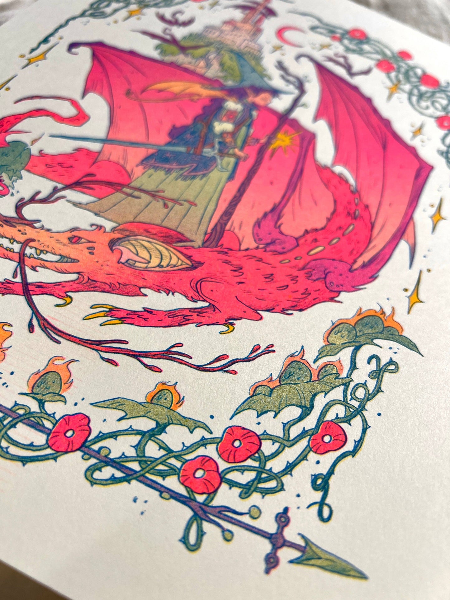 Dragon Witch risograph print, Natalie Andrewson riso print, spooky season witch art, bats as dragons illustration, witch and dragon artwork, Giant Robot Flying Creatures art, blue yellow fluorescent pink riso, whimsical witchy art print, indie printmaker riso, enchanted fantasy artwork, collectible risograph print, Rogue & Rye artist collection.