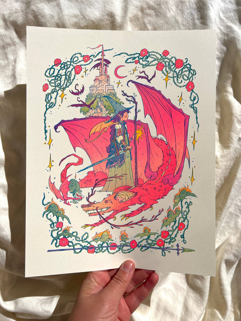 Dragon Witch risograph print, Natalie Andrewson riso print, spooky season witch art, bats as dragons illustration, witch and dragon artwork, Giant Robot Flying Creatures art, blue yellow fluorescent pink riso, whimsical witchy art print, indie printmaker riso, enchanted fantasy artwork, collectible risograph print, Rogue & Rye artist collection.