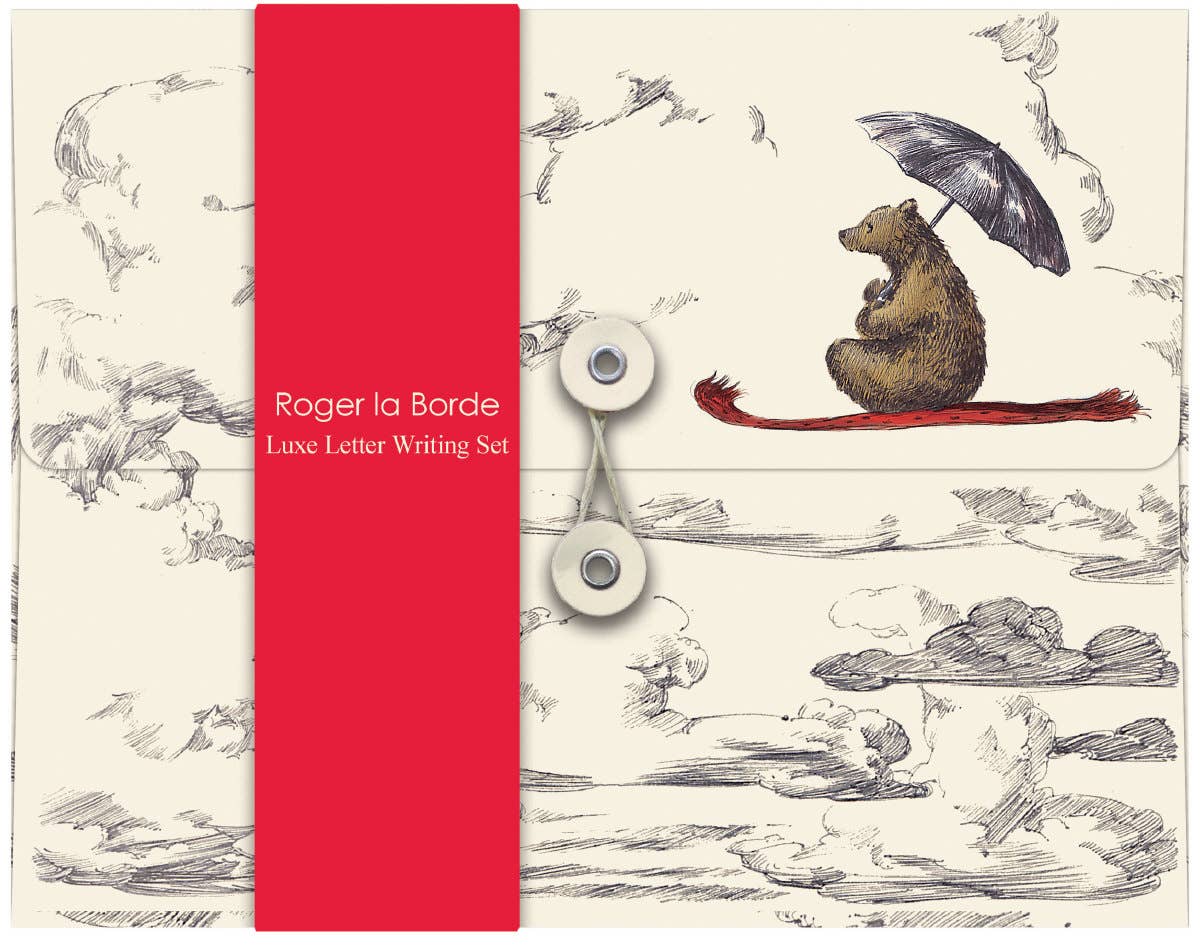 Elise Hurst Flying Bear letter writing set in its illustrated keepsake wallet featuring a bear holding an umbrella beneath a cloudy sky.