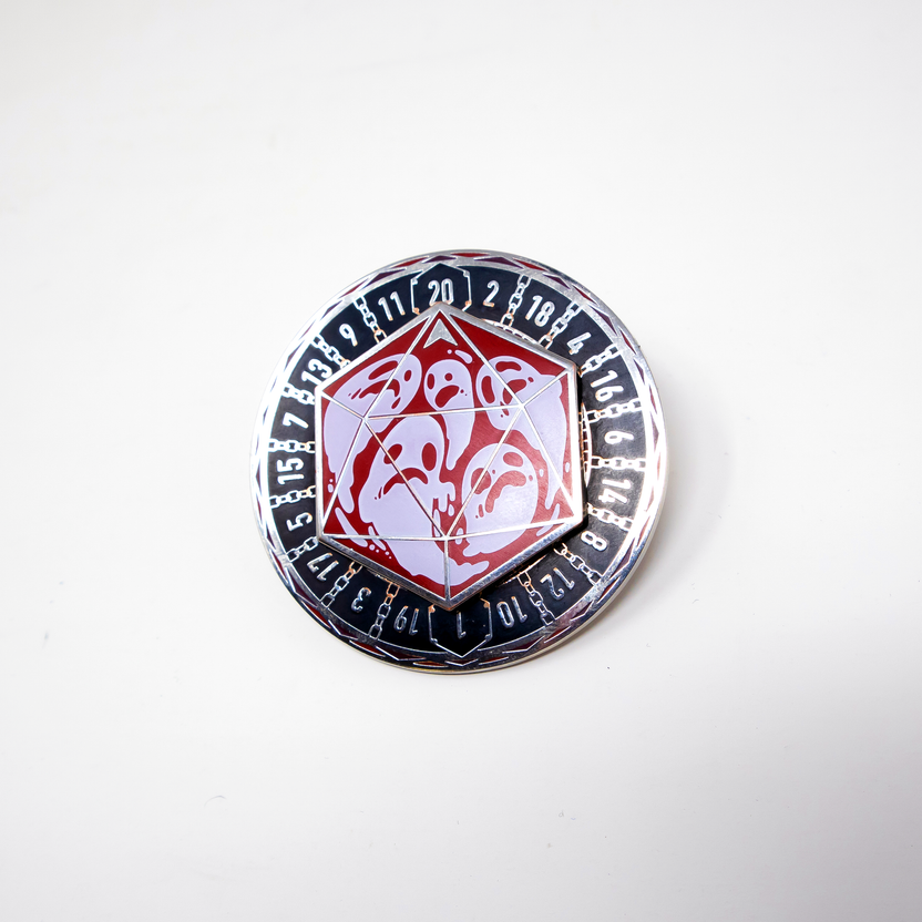 Round Fablemaker Donjon enamel spinner pin shown against a white background
