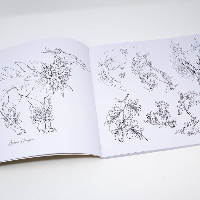 Open Floral Dragons coloring book showing detailed black-and-white dragon illustrations