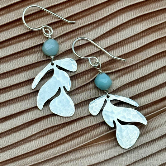 flow earrings silver, amazonite bead earrings, geometric nature earrings, silver triangle and leaf earrings, sterling silver plated earrings, minimalist botanical jewelry, handmade silver earrings, everyday amazonite earrings, silver and gemstone earrings, lightweight silver earrings, hypoallergenic silver earrings, silver dangle earrings with bead, natural balance earrings, modern boho jewelry, clean line earrings