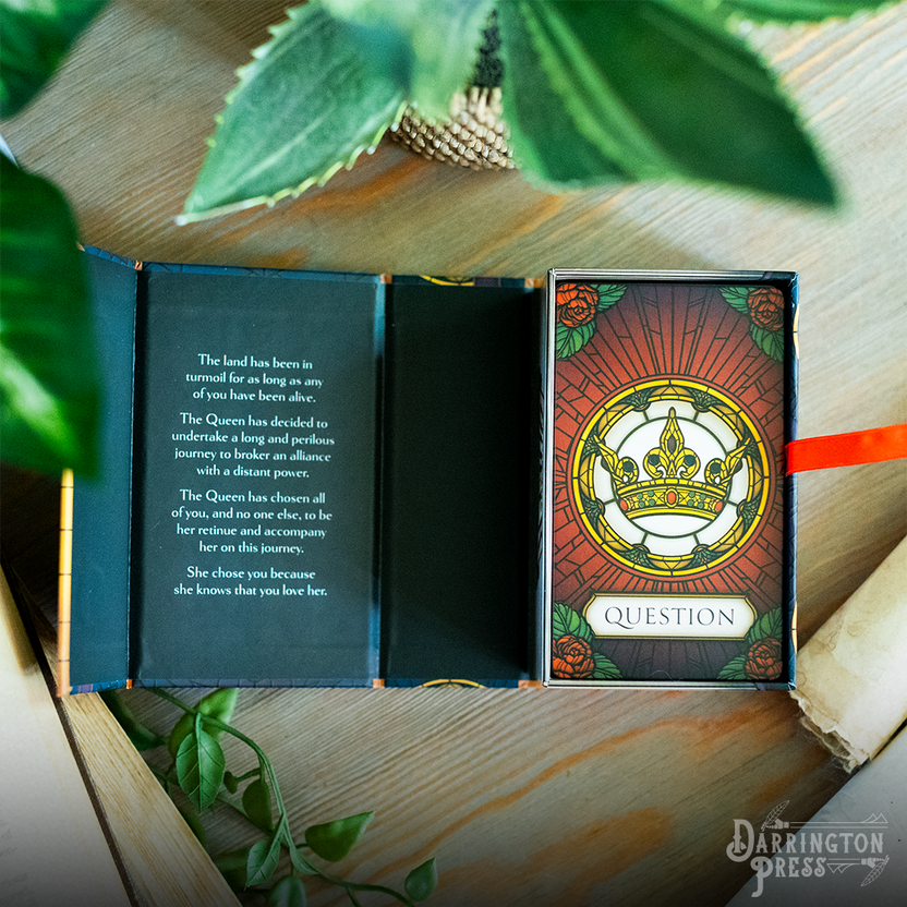 For the Queen storytelling game, Darrington Press narrative game, collaborative roleplaying card game, Critical Role story game, prompt-based RPG, relationship-building card game, 2–6 player storytelling game, quick-start narrative game, immersive roleplay card deck, creative writing tabletop game, card-based worldbuilding game, emotional roleplay experience