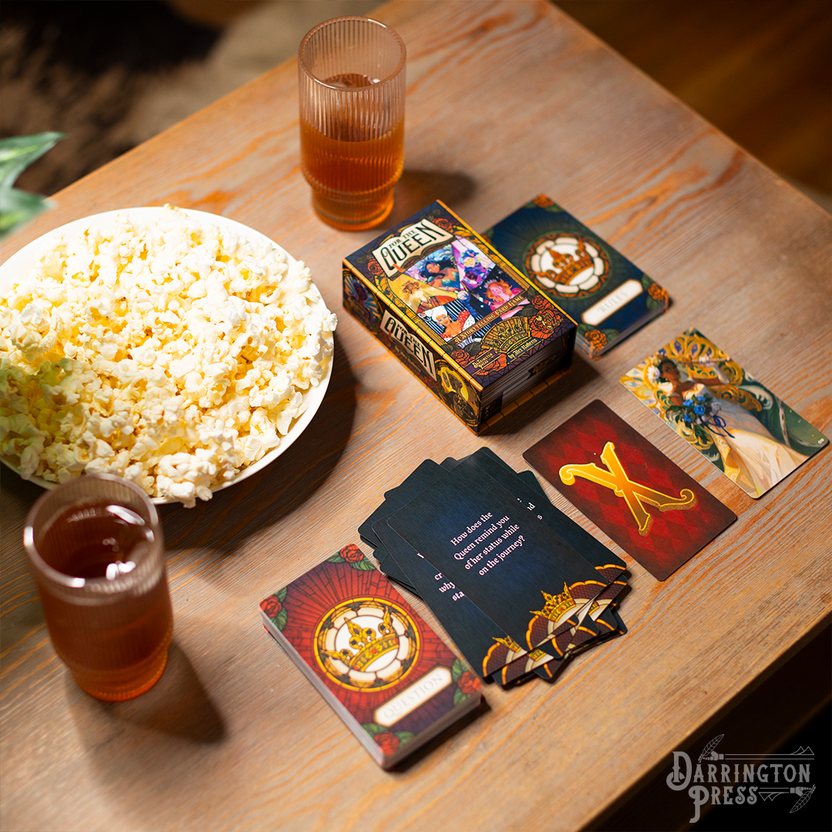 For the Queen storytelling game, Darrington Press narrative game, collaborative roleplaying card game, Critical Role story game, prompt-based RPG, relationship-building card game, 2–6 player storytelling game, quick-start narrative game, immersive roleplay card deck, creative writing tabletop game, card-based worldbuilding game, emotional roleplay experience