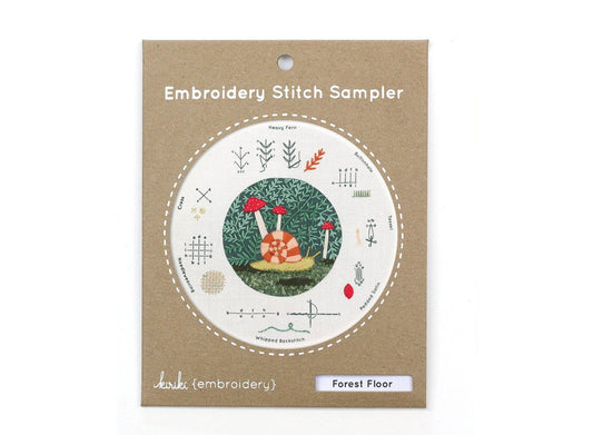 forest floor embroidery sampler, woodland embroidery kit, textured embroidery stitches, Kiriki Press stitch sampler, learn hand embroidery, nature-inspired needlework kit, DMC floss embroidery project, embroidery for beginners, forest theme embroidery, embroidery hoop art