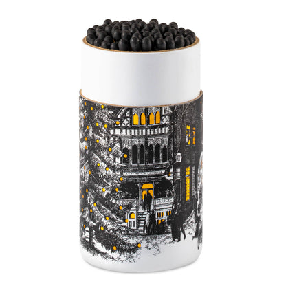 Starry Night match cylinder, Chase & Wonder artwork, large holiday match tube, Christmas town square illustration, luxury safety matches, gold foil winter design, festive mantel décor, UK-made match cylinder, Christmas Eve artwork, elegant fireplace matches, collectible holiday home accessories, Archivist Christmas collection, Rogue & Rye curated gifts, cozy seasonal décor.