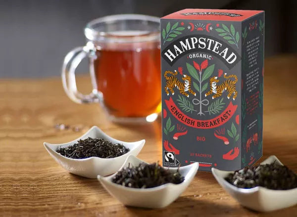 Meet your new easy ritual: the Hampstead Organic Herbal Harmonies Pack (20 teabags) is a calming assortment of organic herbal infusions, perfect for winding down, resetting between tasks, or gifting a little care. Thoughtfully sourced and organically grown, these herbal blends offer naturally caffeine-free comfort with bright, clean flavor—simple to steep, easy to love, and made for everyday sipping. Keep a box in the pantry for cozy evenings, gentle mornings, and those “I need a moment” afternoons.