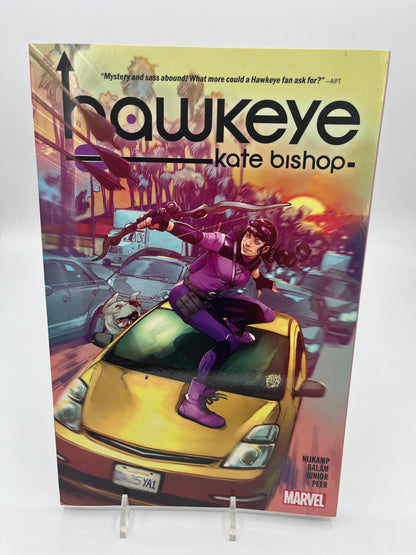 Cover of Hawkeye: Kate Bishop featuring Kate Bishop in her purple Hawkeye costume standing atop a yellow car with bow drawn in a busy city street.