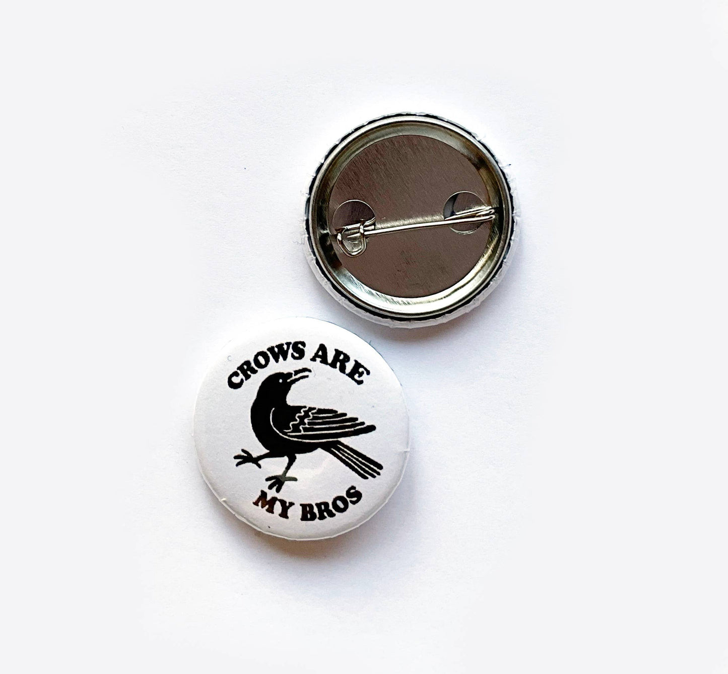 Hissing Mink Crows are My Bros button featuring a playful crow design for bird lovers, nature enthusiasts, and Pacific Northwest style