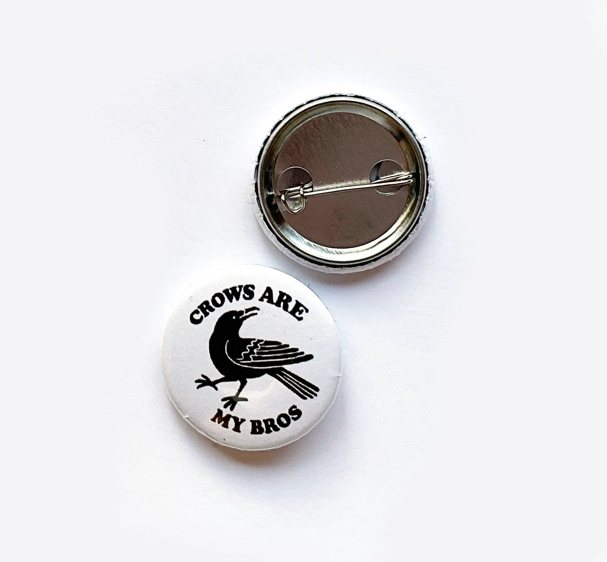Hissing Mink Crows are My Bros button featuring a playful crow design for bird lovers, nature enthusiasts, and Pacific Northwest style