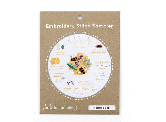 honeybee embroidery kit, embroidery stitch sampler, Kiriki Press honeybee pattern, learn embroidery stitches, bee-themed embroidery kit, DMC embroidery floss sampler, embroidery kit for beginners, embroidery gift for crafters, honeycomb stitch practice, nature embroidery design