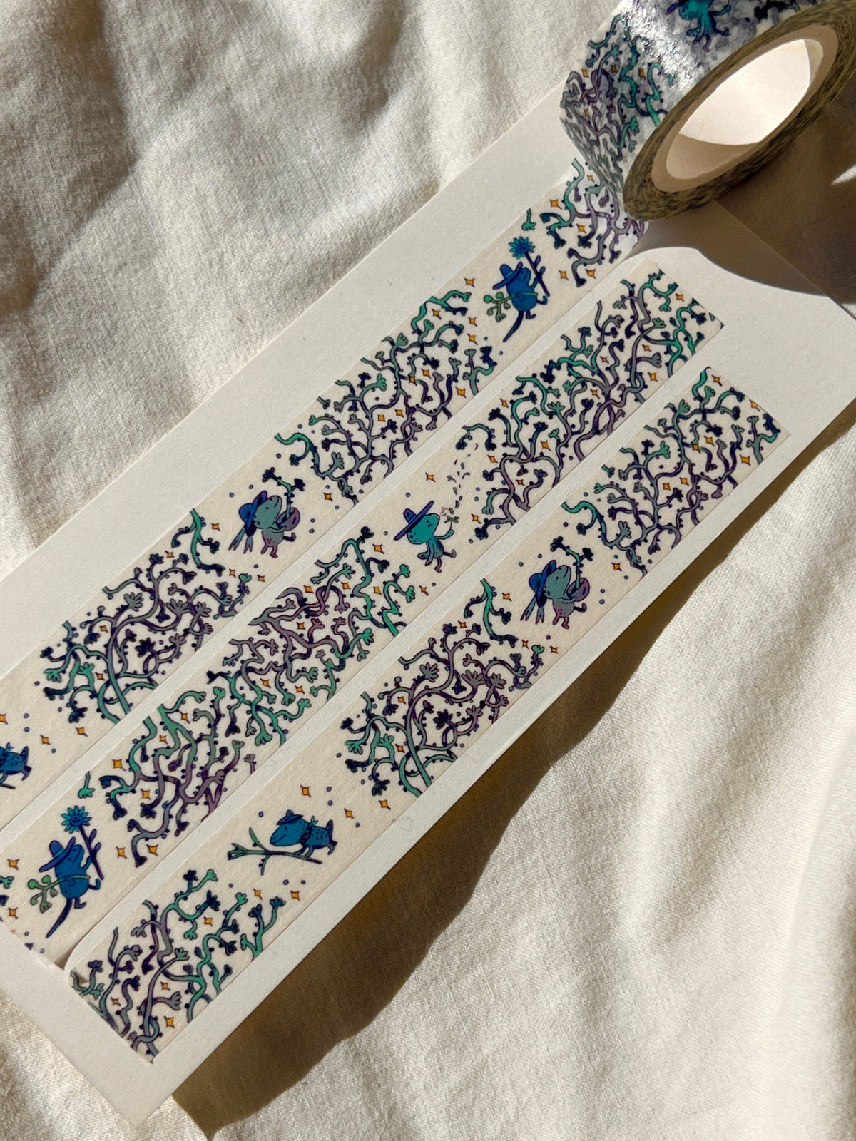 Natalie Andrewson Blue Vine Collector washi tape unrolled to show the illustrated pattern