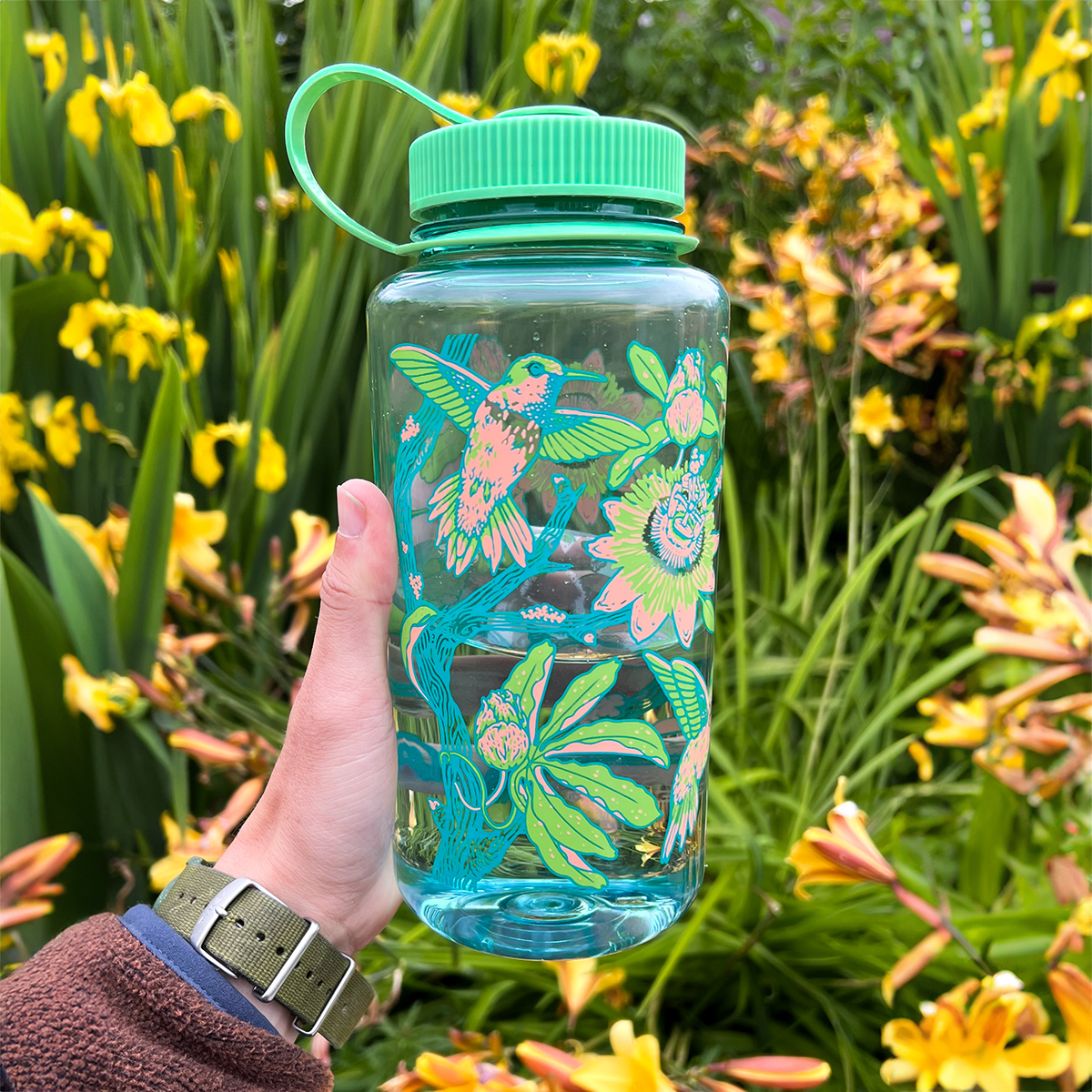 Mustard Beetle Nalgene bottle, Mustard Beetle Hummingbirds water bottle, hummingbird illustration Nalgene, passionflower water bottle design, limited edition 32oz Nalgene, recycled plastic Nalgene bottle, eco-friendly wide mouth bottle, BPA free Nalgene USA made, artist illustrated Nalgene water bottle, Elizabeth Jean Younce artwork, nature inspired hydration bottle, botanical illustration water bottle, functional art bottle, collectible artist Nalgene, wide mouth 32oz bottle, outdoor adventure water bottle