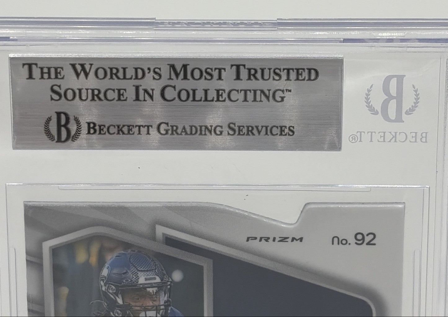 Close-up of Beckett Grading Services slab and authentication holder for 2024 Panini Spectra Kenneth Walker III Neon Blue Die-Cut card.