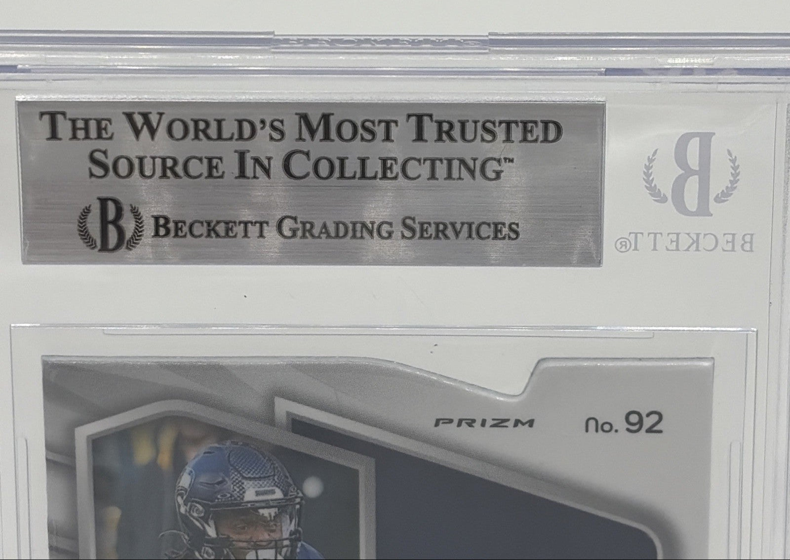 Close-up of Beckett Grading Services slab and authentication holder for 2024 Panini Spectra Kenneth Walker III Neon Blue Die-Cut card.