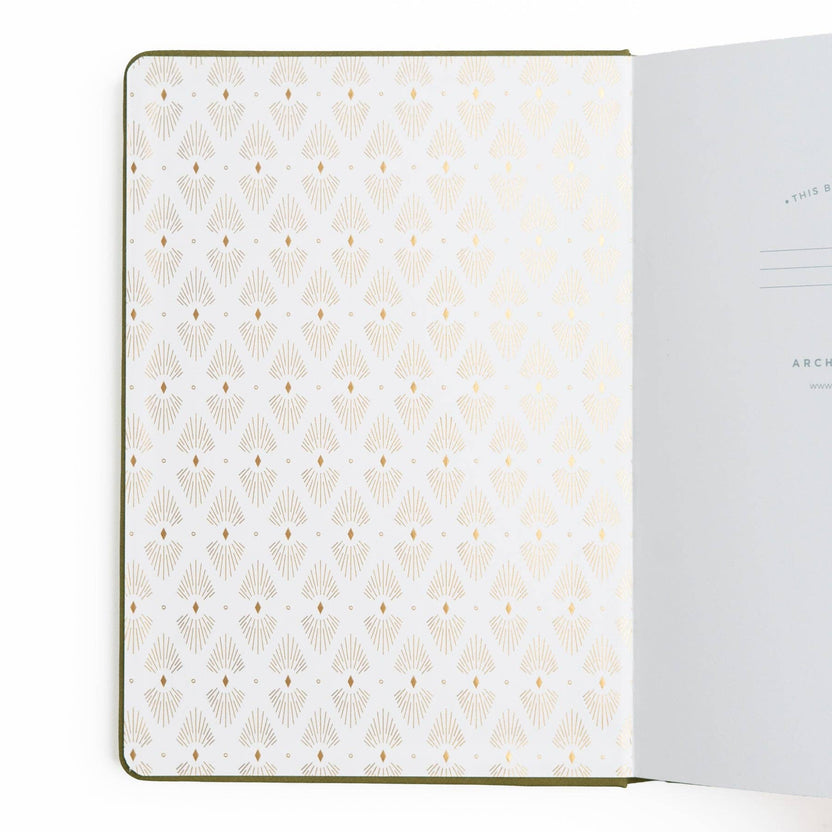 Decorative patterned endpaper inside Archer and Olive Literary Frog notebook