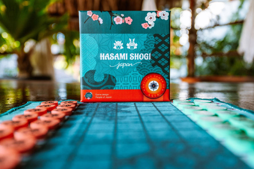 Hasami Shogi game, Hasami Shogi board game, Hasami Shogi Japan, Scissor Chess game, scissor chess board game, Shogi variant game, Japanese abstract strategy game, 2 player strategy game, 2 player board game ages 6 and up, 20 minute strategy game, family strategy board game, classic games collection, LUDOS Collection, LUDOS Asia, volume 1 LUDOS Asia, preserve games of the past, samurai strategy game, capture by sandwiching pieces game, five in a row strategy game, educational strategy game for kids, travel f