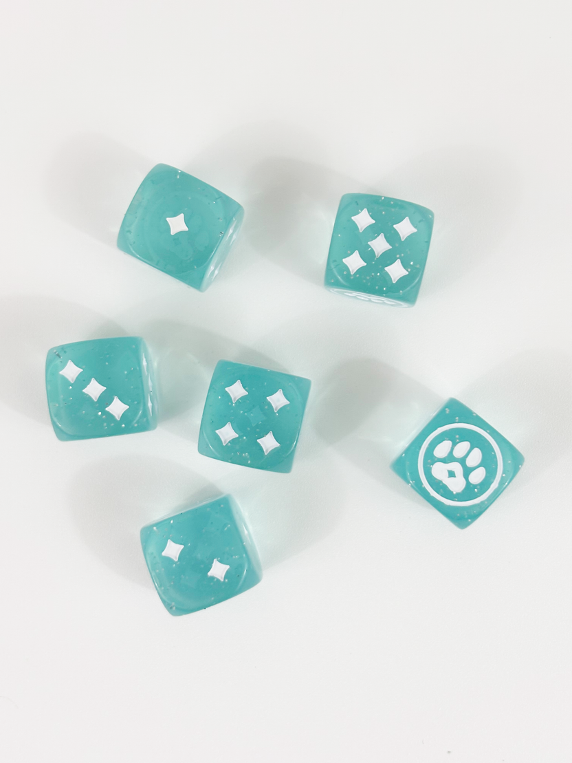 Sparkly blue dice with custom kitty paw symbols for Magical Kitties Save the Day