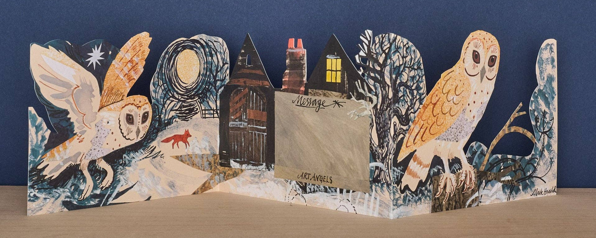 Mark Hearld Silent Flight accordion greeting card opened to show woodland illustrations, owls, and the blank message panel.