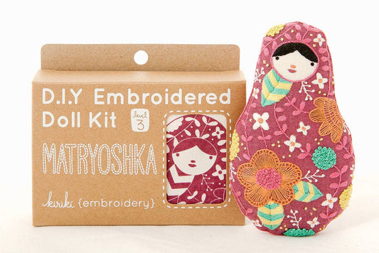 matryoshka embroidery kit, embroidered nesting doll craft, Kiriki Press embroidery, Level 3 embroidery pattern, DIY stitched doll, hand embroidery project, screen printed fabric kit, DMC floss embroidery, heritage-inspired sewing kit, handmade gift idea