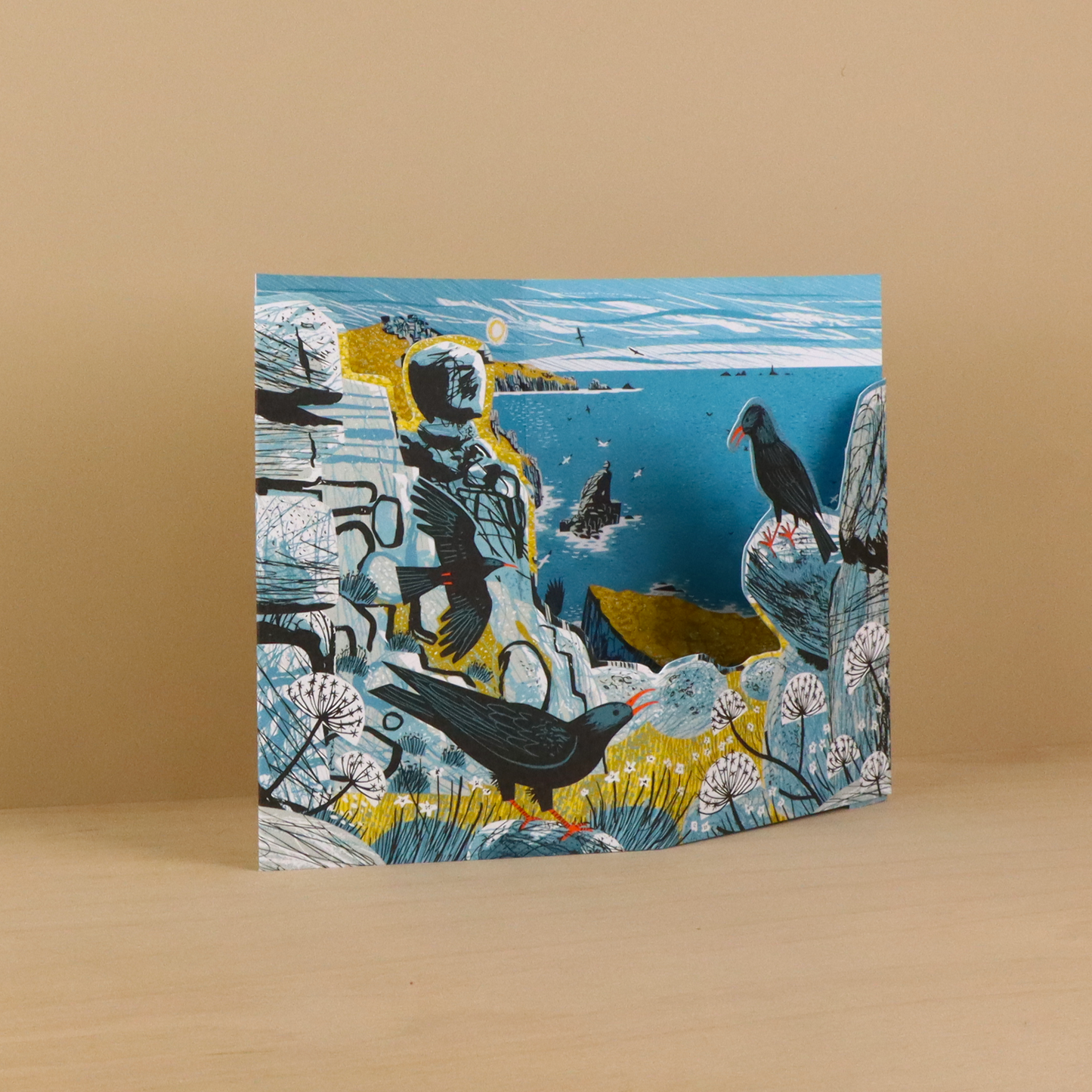 Front of the Matt Johnson Mayon Cliff Choughs greeting card featuring choughs on rugged coastal cliffs overlooking the sea.