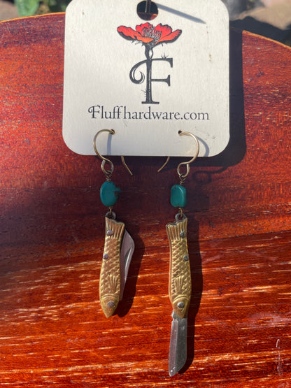 mini knife earrings, functional fashion earrings, rogue jewelry for gamers, fantasy cosplay earrings, high fashion gamer accessories, turquoise knife earrings, hidden blade earrings, stylish rpg gear, edgy earrings for women, gamer fashion accessories, dnd inspired jewelry, critical role style earrings, knife earrings real blade, tiny pocket knife earrings, fashion meets fantasy jewelry
