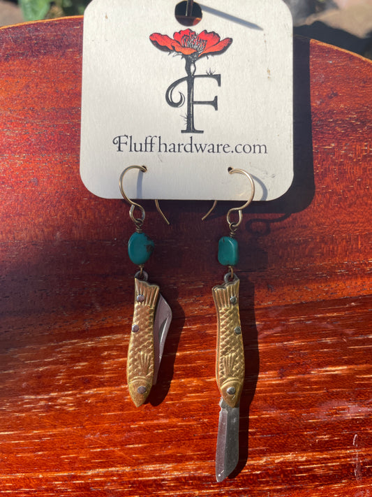 mini knife earrings, functional fashion earrings, rogue jewelry for gamers, fantasy cosplay earrings, high fashion gamer accessories, turquoise knife earrings, hidden blade earrings, stylish rpg gear, edgy earrings for women, gamer fashion accessories, dnd inspired jewelry, critical role style earrings, knife earrings real blade, tiny pocket knife earrings, fashion meets fantasy jewelry