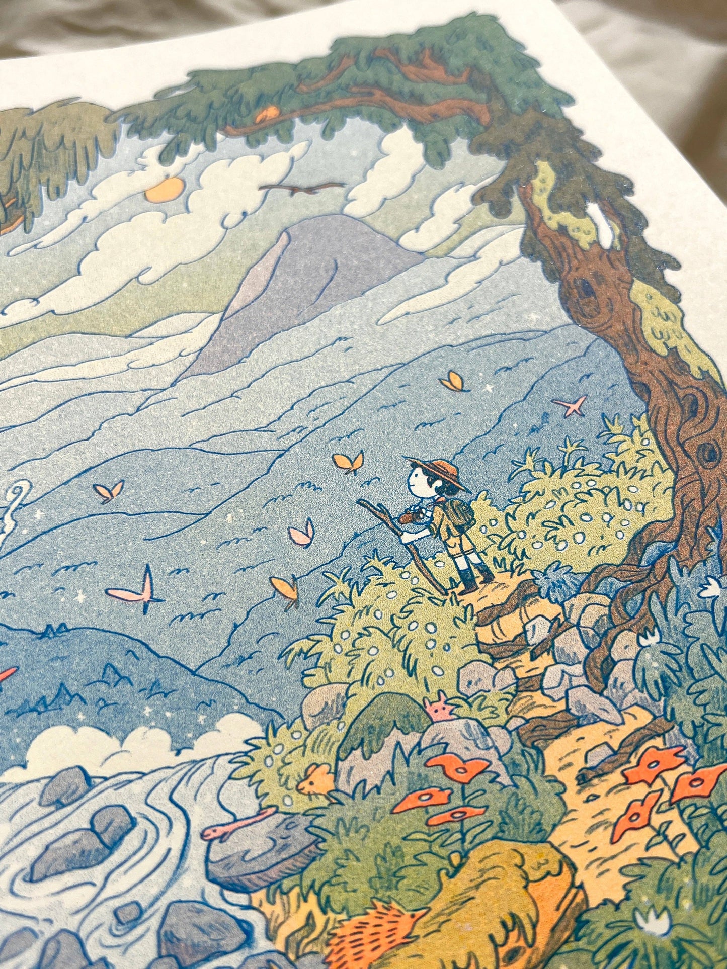 Mountain Dreams risograph print, mountain landscape riso art, Natalie Andrewson riso print, blue fluorescent orange yellow riso, scenic mountain illustration, wanderer wall art, adventure-inspired riso print, indie printmaker artwork, dreamy mountain landscape print, vibrant layered ink art, collectible riso print, Rogue & Rye artist collection.