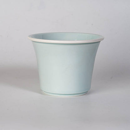 mountain tea mug, porcelain tea mug with infuser, Urban Tokyo tea mug, Japanese-style tea mug, loose-leaf tea brewing mug, black porcelain infuser mug, lidded tea mug, modern minimalist tea cup, gift for tea lovers, mountain design drinkware, elegant kitchen gifts, ceramic tea mug with strainer, Rogue & Rye cozy rituals collection, everyday tea essentials, Japanese home goods aesthetic.