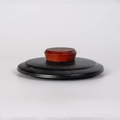 mountain tea mug, porcelain tea mug with infuser, Urban Tokyo tea mug, Japanese-style tea mug, loose-leaf tea brewing mug, black porcelain infuser mug, lidded tea mug, modern minimalist tea cup, gift for tea lovers, mountain design drinkware, elegant kitchen gifts, ceramic tea mug with strainer, Rogue & Rye cozy rituals collection, everyday tea essentials, Japanese home goods aesthetic.