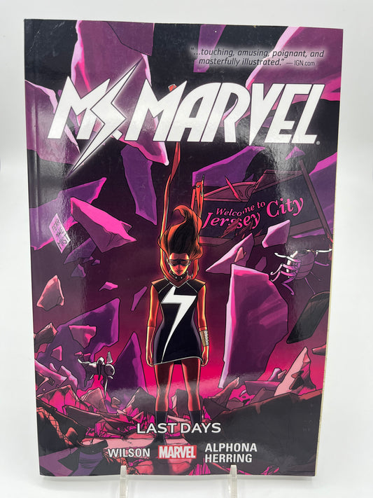 Cover of Ms. Marvel: Last Days featuring Kamala Khan standing amid shattered debris and glowing purple ruins in Jersey City.