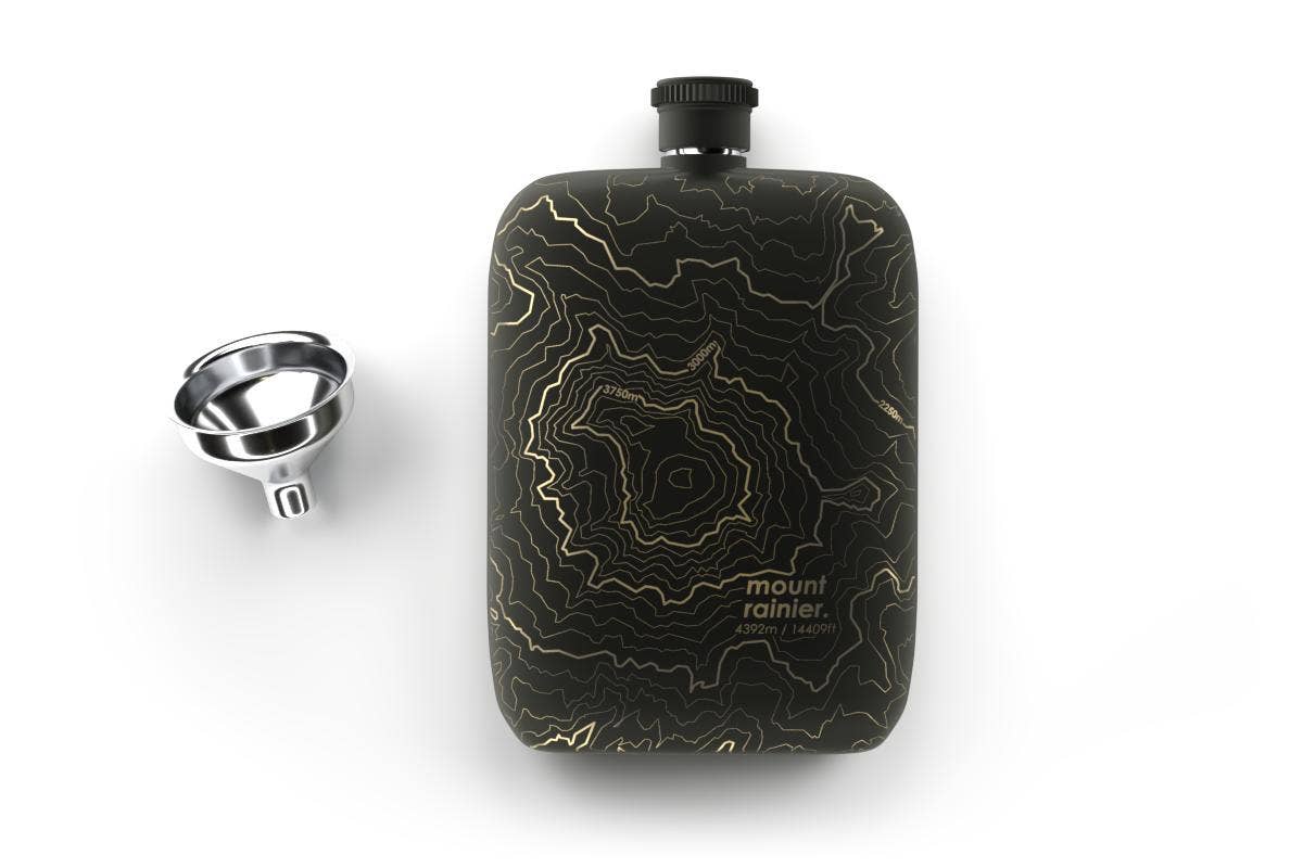 Mt. Rainier topography flask, Washington mountain flask, Well Told stainless steel flask, etched topographic map gift, outdoor adventure flask, Pacific Northwest gift ideas, engraved mountain flask, black or white steel flask, topography map drinkware, hiker and climber gifts, pocket flask with funnel, Mt. Rainier souvenir gift, Rogue & Rye adventure collection, outdoor lifestyle gifts, local reimagined flask, precision-etched stainless steel.