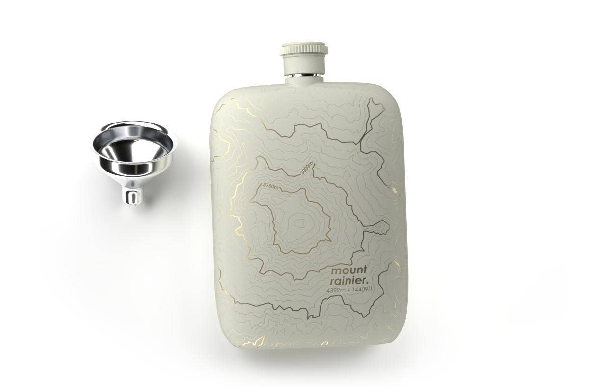Mt. Rainier topography flask, Washington mountain flask, Well Told stainless steel flask, etched topographic map gift, outdoor adventure flask, Pacific Northwest gift ideas, engraved mountain flask, black or white steel flask, topography map drinkware, hiker and climber gifts, pocket flask with funnel, Mt. Rainier souvenir gift, Rogue & Rye adventure collection, outdoor lifestyle gifts, local reimagined flask, precision-etched stainless steel.