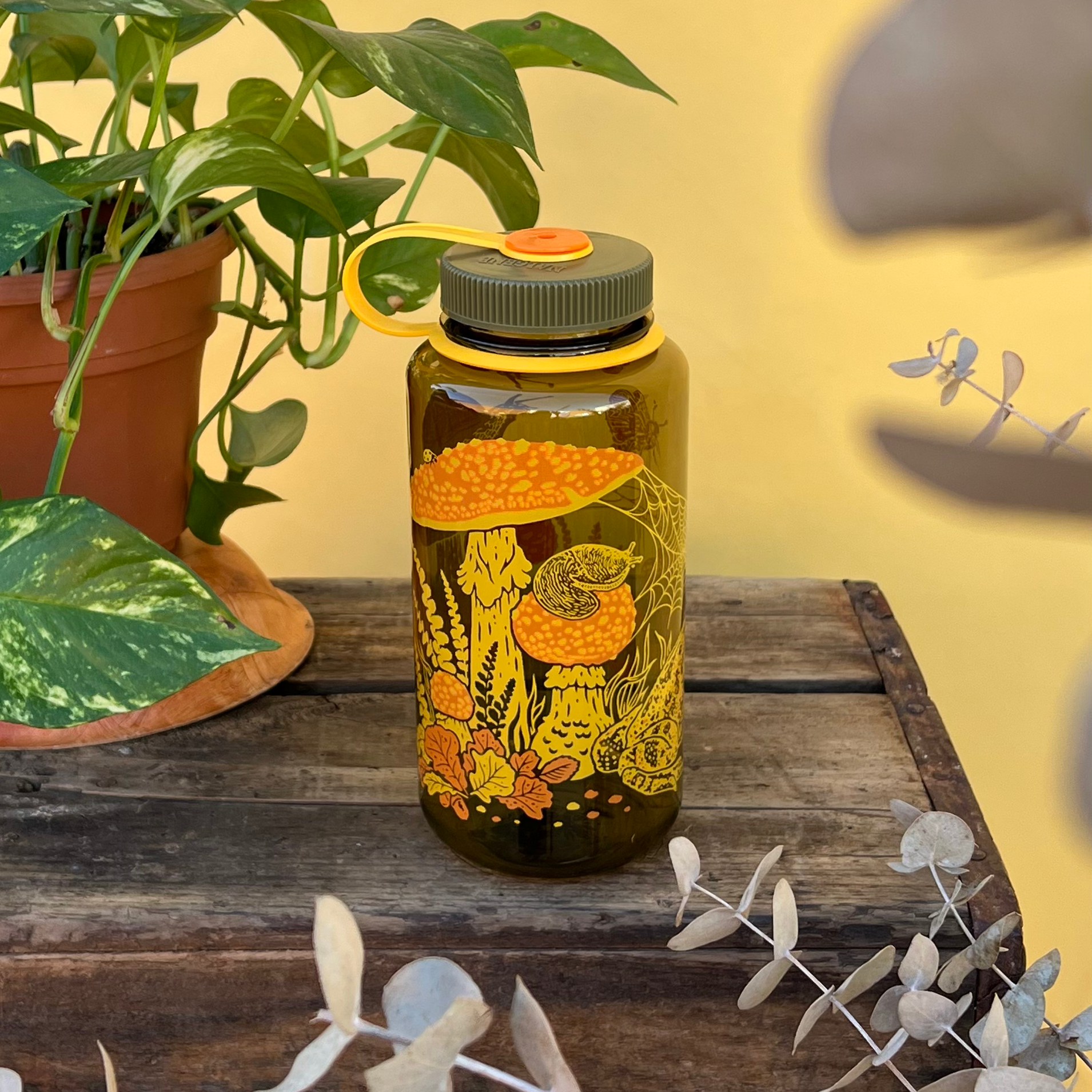 Mustard Beetle Nalgene bottle, Mustard Beetle Toad illustration water bottle, limited edition Nalgene 16oz, recycled plastic Nalgene bottle, eco-friendly water bottle, BPA-free Nalgene USA made, artist illustrated water bottle, nature inspired water bottle, toad illustration bottle, small business artist Nalgene collaboration, Los Angeles illustrator Elizabeth Jean Younce, Mustard Beetle outdoor bottle, functional art water bottle, 50 percent recycled plastic bottle, collectible artist Nalgene, wide mouth N