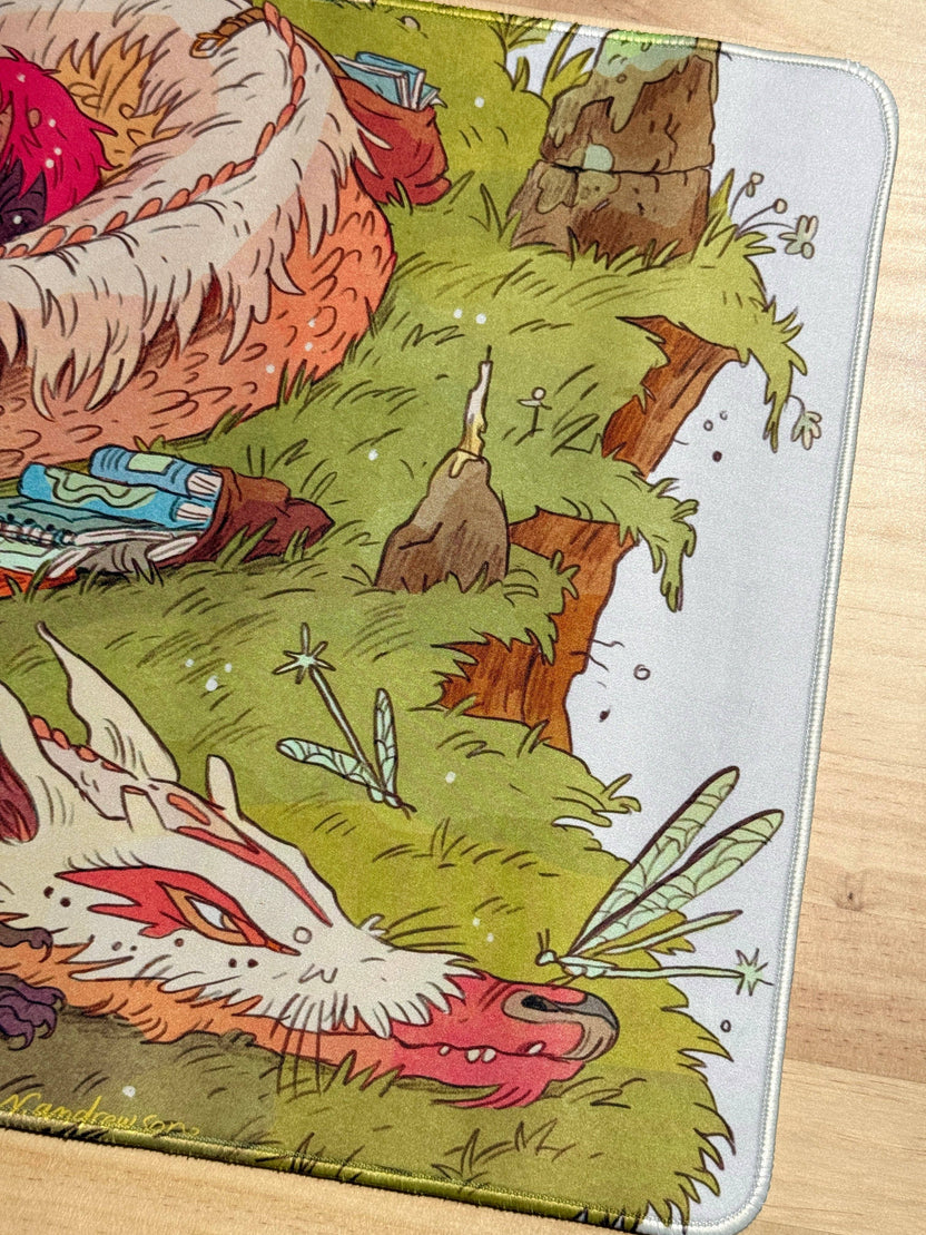 Close-up of Natalie Andrewson Book Dragon playmat artwork