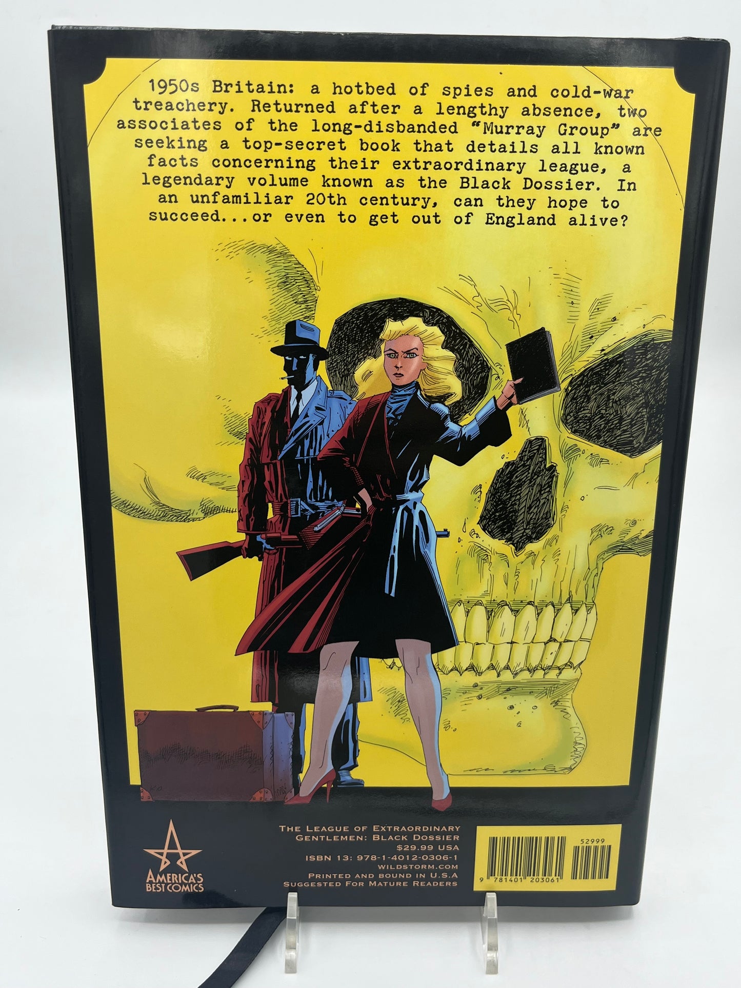 Preowned Like New hardcover edition of The League of Extraordinary Gentlemen: The Black Dossier by Alan Moore and Kevin O’Neill. This premium-format graphic novel is known for its inventive “dossier” presentation and collectible design, including a 3-D section in many editions. A great pick for fans of literary mashups, steampunk/alt-history comics, and high-design graphic novel hardcovers.