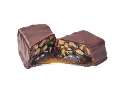 Oregon Bark Lou Whistle, molasses pecan chew candy, pecan pie candy in dark chocolate, chewy pecan chocolate candy, molasses dark chocolate candy, vegan dark chocolate candy, gluten free candy box, Portland Oregon handmade candy, artisan candy Portland, small batch vegan candy, plastic free packaged candy, sustainable candy gift, dairy free pecan candy, chewy candy covered in dark chocolate, pecan molasses chocolate chew, two bars per box candy, boxed candy gift, coffee pairing candy, chai pairing candy, bo