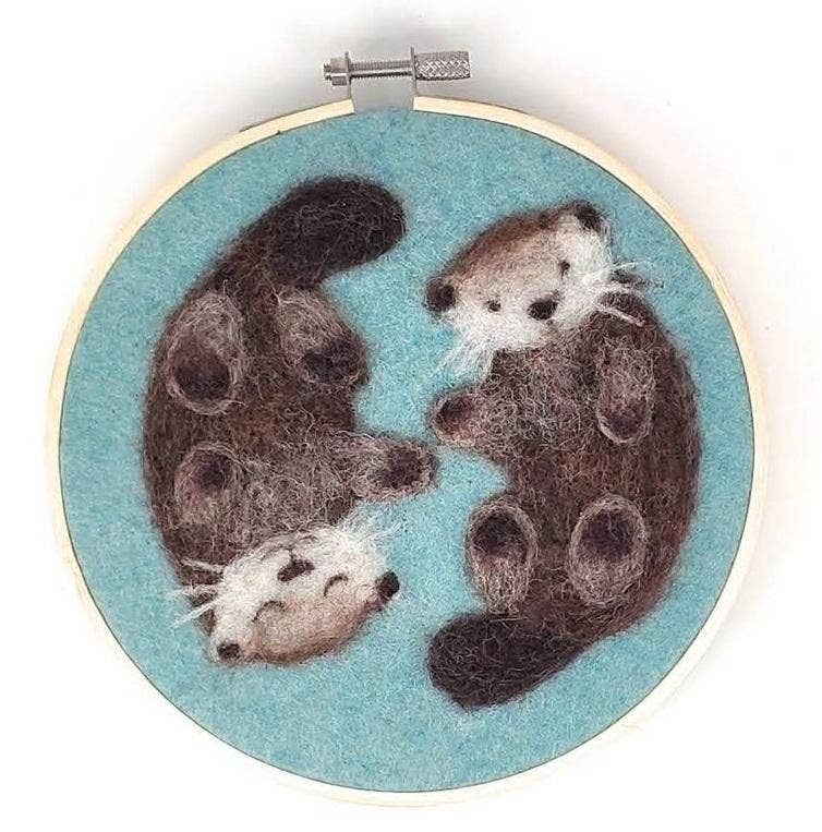 otters needle felting kit, otters in a hoop craft kit, painting with wool otters, beginner needle felting project, diy wool animal art, corriedale wool felting kit, 2d felting kit with hoop, otter wall art craft kit, crafty kit company otters, wool felt otter kit, felt animal couple project, scottish felting kits, embroidery hoop felt animals, felt otter gift idea, eco-friendly craft kit