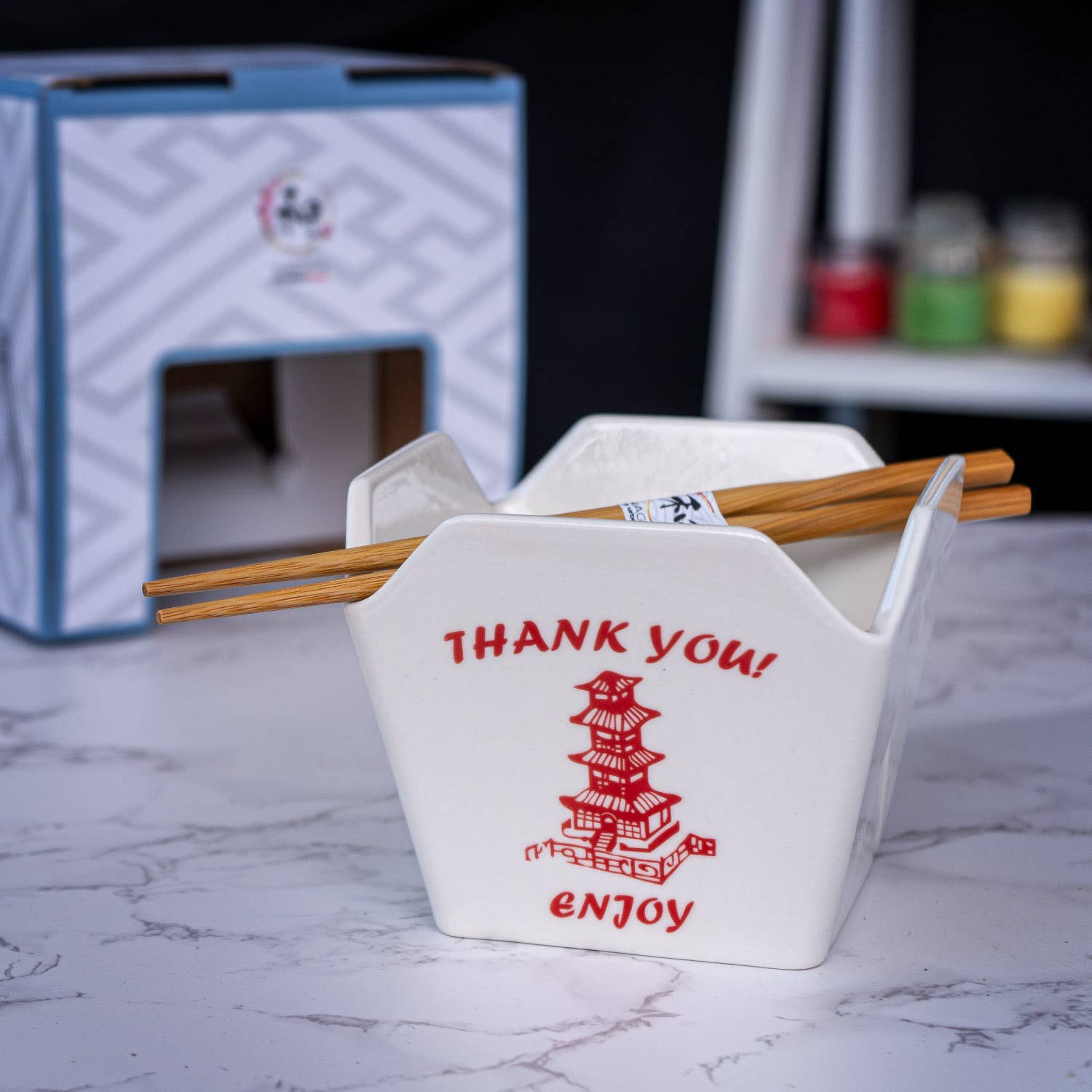 pagoda takeout box bowl, ceramic ramen bowl with chopsticks, reusable takeout container bowl, Urban Tokyo pagoda bowl, Japanese-style noodle bowl, microwave safe ceramic bowl, dishwasher safe takeout bowl, fun kitchen gift, Asian-inspired dinnerware, noodle bowl with chopstick holder, Rogue & Rye kitchen and home collection, ceramic takeout design, red pagoda bowl gift.