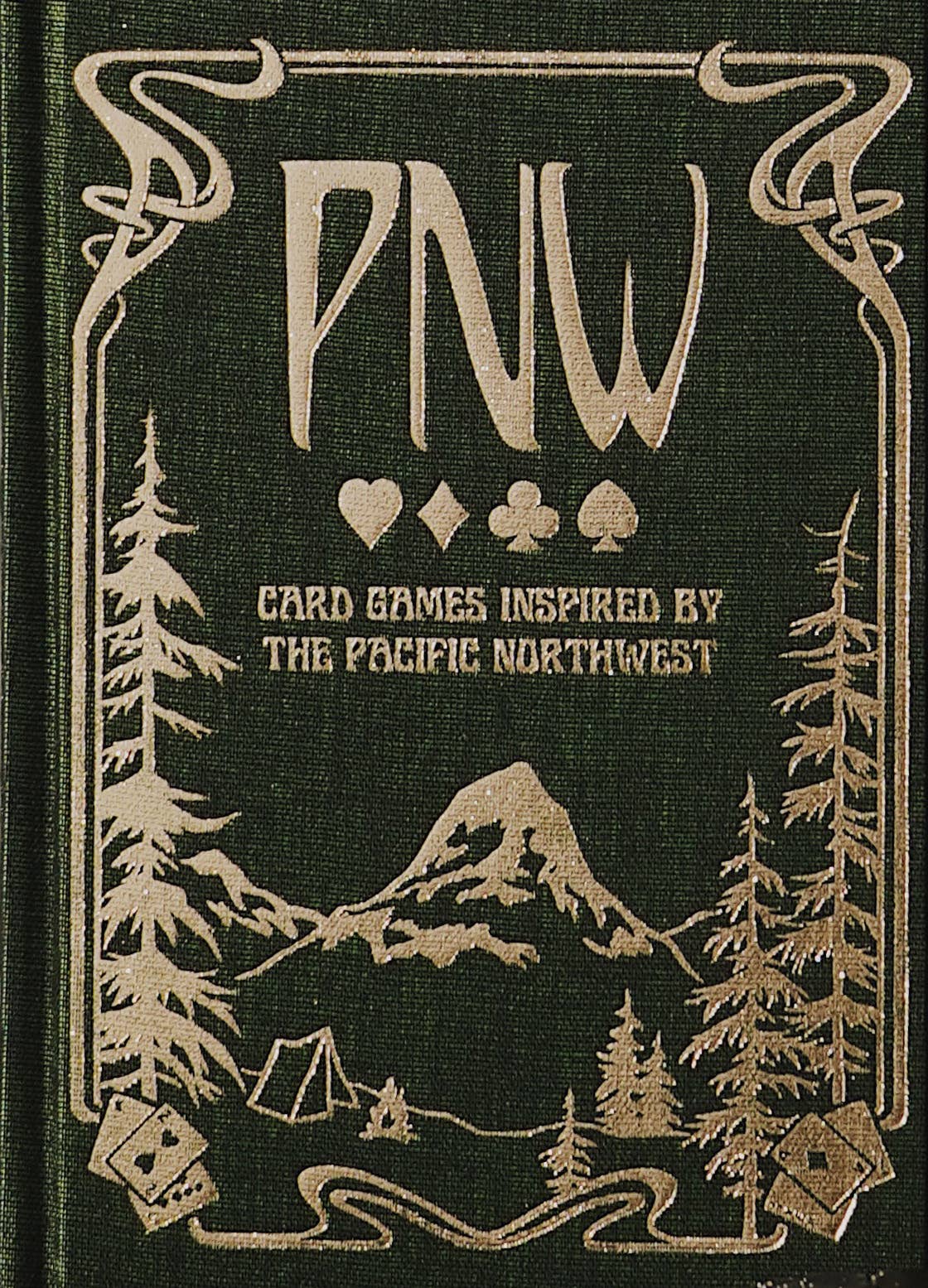 pnw card games book, pacific northwest inspired games, megan wyreweden art, thomas cardwell game designer, nature themed card games, foraging card games, orca salmon mushroom games, coastal forest games, pacific northwest game night, illustrated card game book, camping games with deck of cards, solo and group card games, pnw camping activities, original card games book, pacific northwest gifts, travel