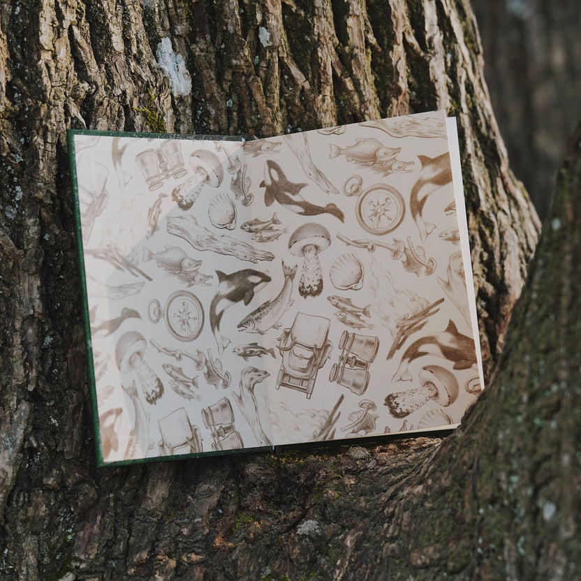 pnw card games book, pacific northwest inspired games, megan wyreweden art, thomas cardwell game designer, nature themed card games, foraging card games, orca salmon mushroom games, coastal forest games, pacific northwest game night, illustrated card game book, camping games with deck of cards, solo and group card games, pnw camping activities, original card games book, pacific northwest gifts, travel