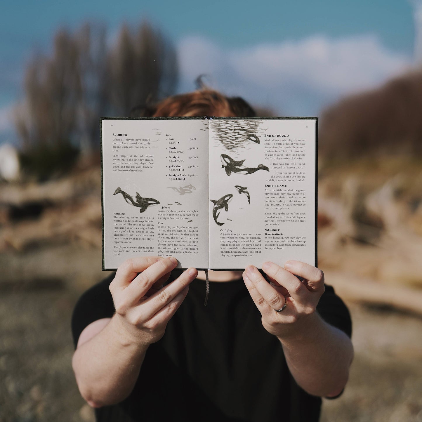 pnw card games book, pacific northwest inspired games, megan wyreweden art, thomas cardwell game designer, nature themed card games, foraging card games, orca salmon mushroom games, coastal forest games, pacific northwest game night, illustrated card game book, camping games with deck of cards, solo and group card games, pnw camping activities, original card games book, pacific northwest gifts, travel