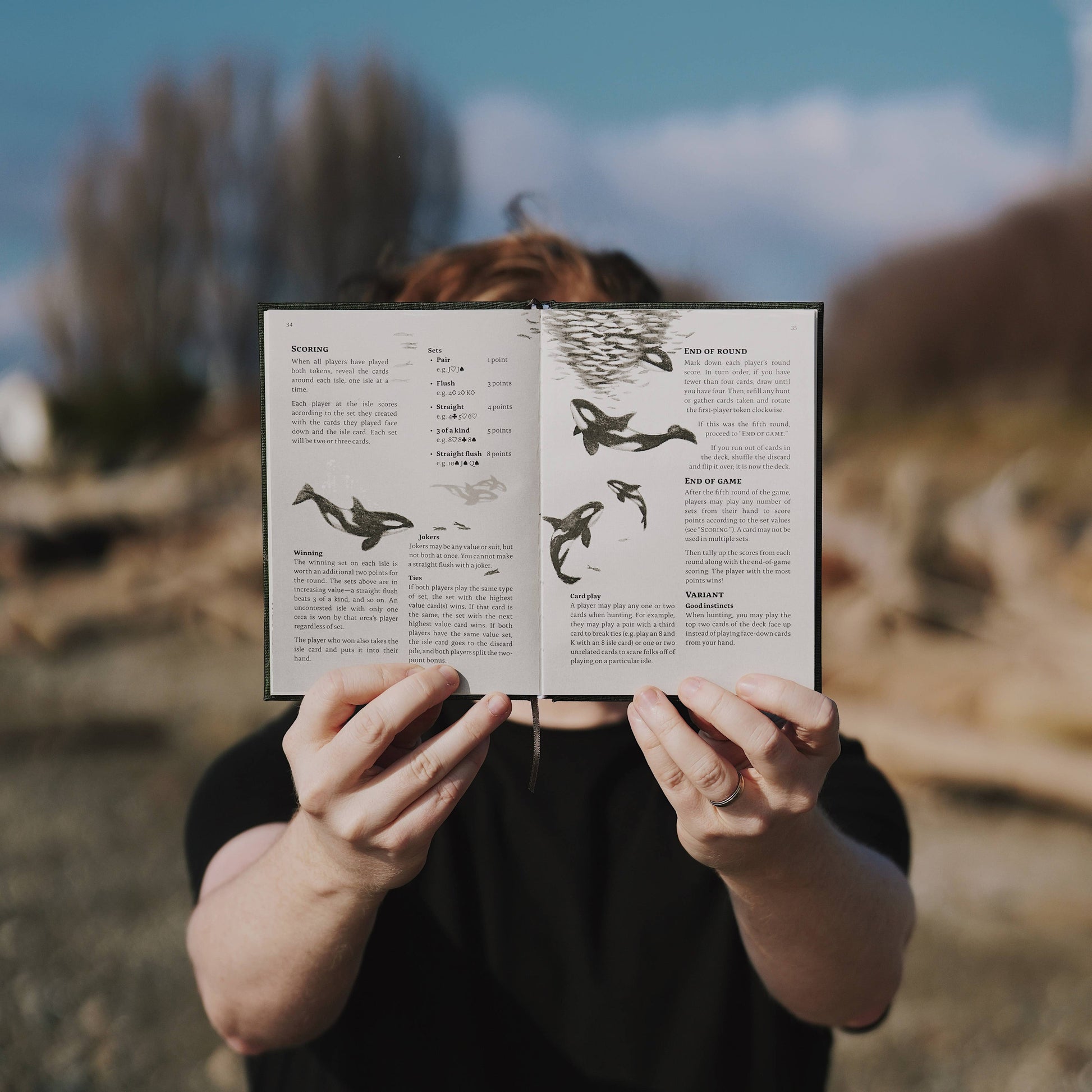 pnw card games book, pacific northwest inspired games, megan wyreweden art, thomas cardwell game designer, nature themed card games, foraging card games, orca salmon mushroom games, coastal forest games, pacific northwest game night, illustrated card game book, camping games with deck of cards, solo and group card games, pnw camping activities, original card games book, pacific northwest gifts, travel