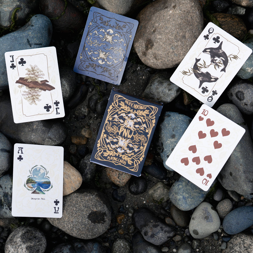 PNW playing cards, Pacific Northwest gifts, PNW wildlife cards, mushroom playing cards, nature playing cards, illustrated card deck, Pacific Northwest art deck, PNW game night, botanical playing cards, wildlife illustrations, trail-inspired playing cards, smooth shuffle cards, high-quality card deck, unique PNW gift, family-run game studio, Gameswell playing cards, Pacific Northwest mushrooms, PNW artisan gift, Rogue & Rye card games, nature lover gift idea, eco-inspired playing cards, illustrated face card