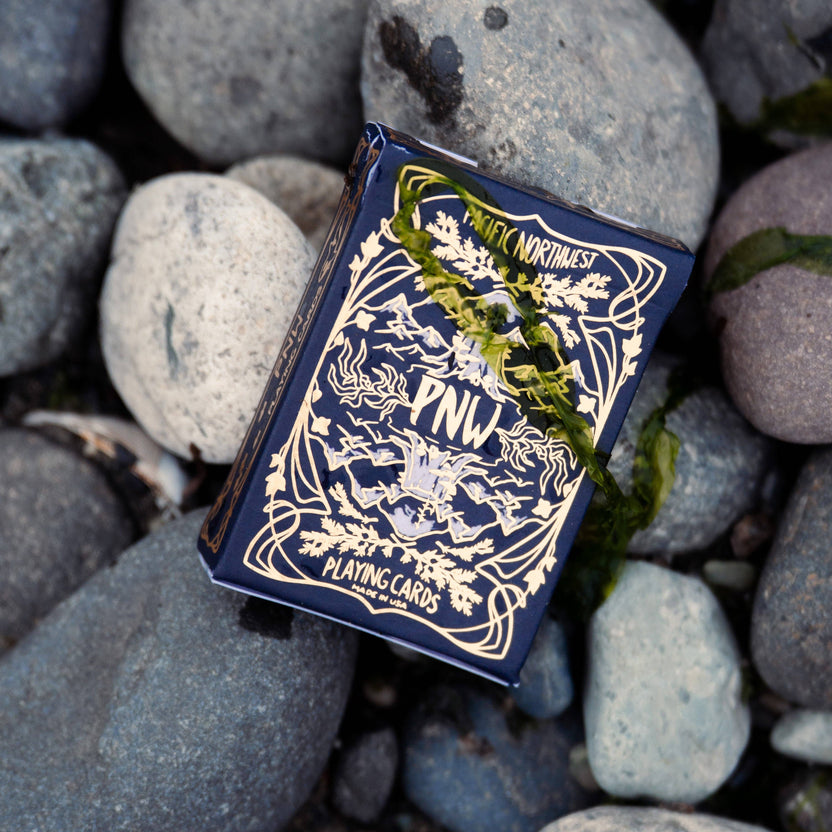 PNW playing cards, Pacific Northwest gifts, PNW wildlife cards, mushroom playing cards, nature playing cards, illustrated card deck, Pacific Northwest art deck, PNW game night, botanical playing cards, wildlife illustrations, trail-inspired playing cards, smooth shuffle cards, high-quality card deck, unique PNW gift, family-run game studio, Gameswell playing cards, Pacific Northwest mushrooms, PNW artisan gift, Rogue & Rye card games, nature lover gift idea, eco-inspired playing cards, illustrated face card