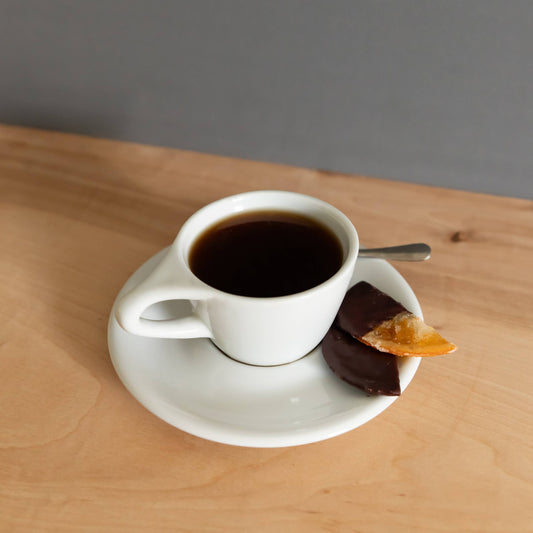 candied oranges in dark chocolate, chocolate-covered oranges, artisan chocolate Portland Oregon, small-batch chocolate, Ranger Chocolate Co., award-winning chocolate 2025, handcrafted chocolate gifts, gourmet citrus chocolate, premium organic cacao, bean-to-bar chocolate Portland, fair trade chocolate treats, holiday chocolate gifts, Rogue and Rye artisan foods, Pacific Northwest chocolate makers, chocolate for gifting, ethical chocolate brands, Portland specialty foods, chocolate dipped fruit, citrus confe