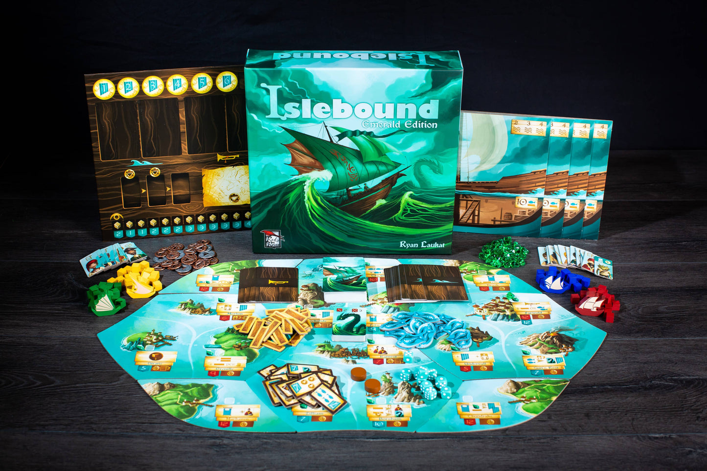 Islebound Emerald Edition, Islebound board game, Red Raven Games Islebound, World of Arzium board game, Ryan Laukat game, sea faring strategy board game, nautical fantasy board game, archipelago board game, pirates and sea monsters board game, trade build invade board game, island town strategy game, capital city building board game, crew hiring board game, emerald resource board game, revised building deck Emerald Edition, 2 to 4 player strategy game, 30 minute strategy board game, fantasy adventure strate